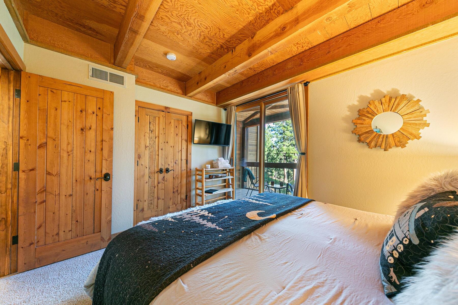 5105 Gold Bend Truckee, CA 96161 - Photo 12 of 27 a bedroom with a bed and a large window