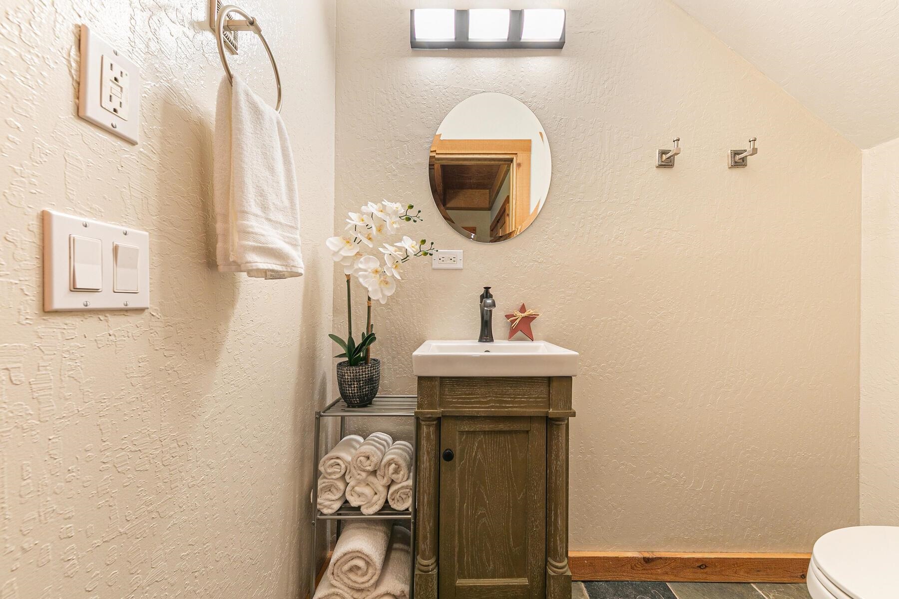5105 Gold Bend Truckee, CA 96161 - Photo 16 of 27 a bathroom with a toilet sink and mirror