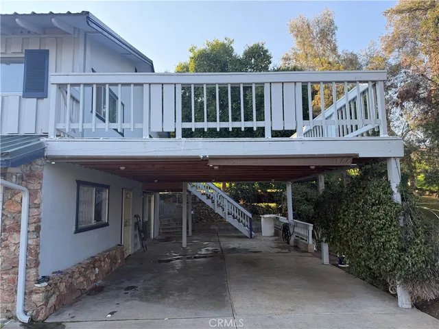 a view of house with a outdoor space and seating space