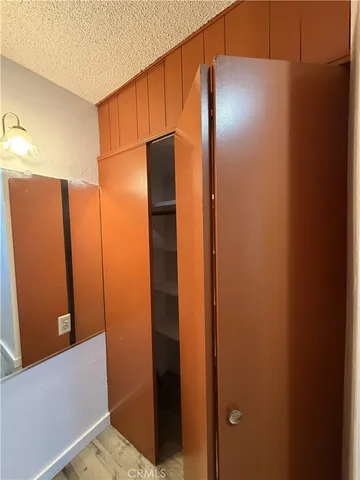 a bathroom with a shower and a mirror