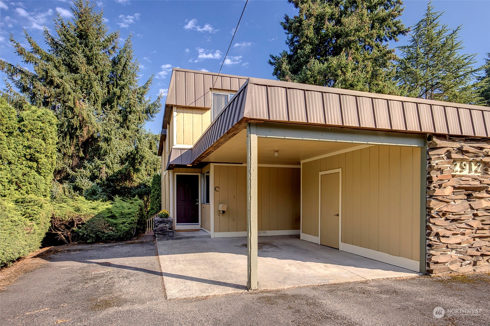 2912 Northeast 8th Street Renton, WA 98056 - Photo 1 of 22 a view of a house with a garage and balcony