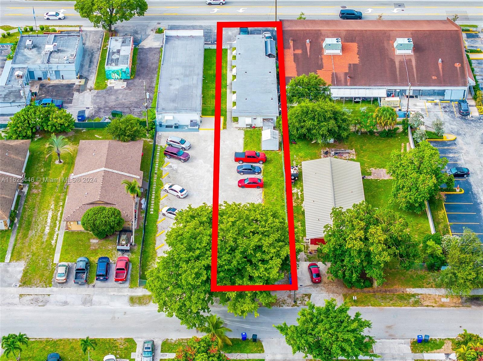 5719 Johnson Street, Unit 15 Hollywood, FL 33021 - Photo 25 of 29 a view of building and outdoor space