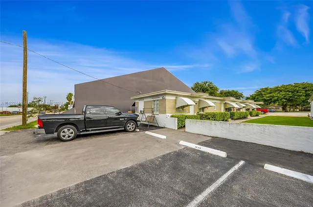 a view of a car in front of house