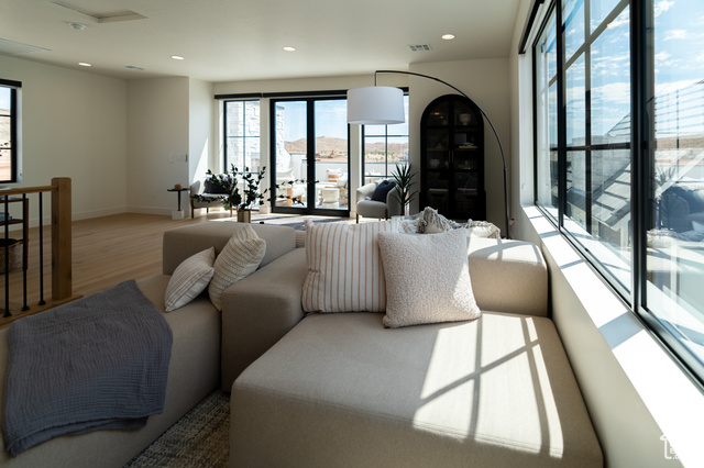 5366 Cyan Lane St. George, UT 84790 - Photo 19 of 39 Living area with plenty of natural light, recessed lighting, and wood finished floors