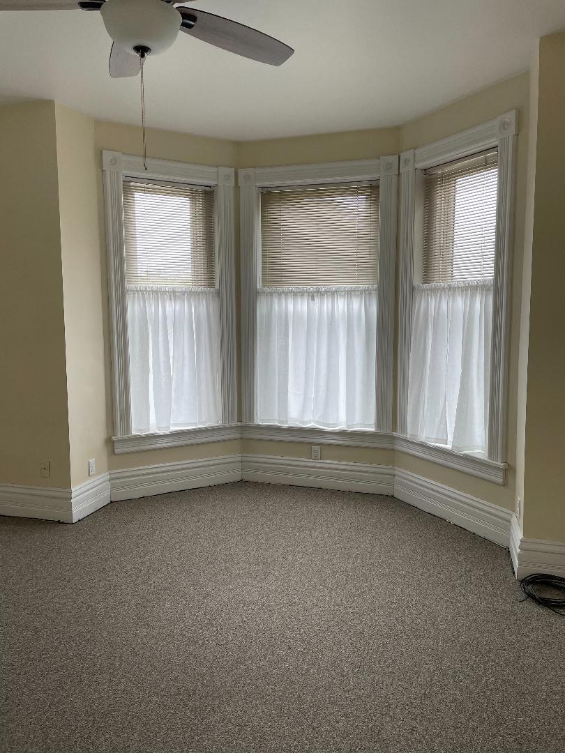 718 Columbus Street Ottawa, IL 61350 - Photo 17 of 23 an empty room with a window
