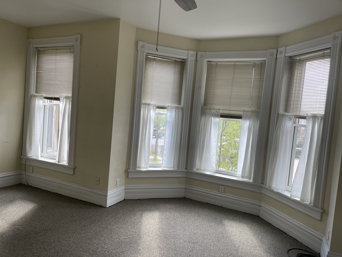 718 Columbus Street Ottawa, IL 61350 - Photo 18 of 23 an empty room with a window and wooden floor