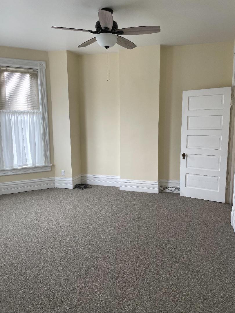 718 Columbus Street Ottawa, IL 61350 - Photo 19 of 23 an empty room with windows and closet