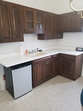 718 Columbus Street Ottawa, IL 61350 - Photo 2 of 23 a kitchen with a sink cabinets and wooden floor