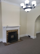 718 Columbus Street Ottawa, IL 61350 - Photo 3 of 23 a living room with a fireplace