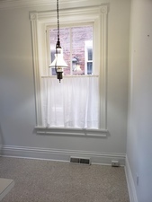 718 Columbus Street Ottawa, IL 61350 - Photo 7 of 23 a bathroom with a window and a shower