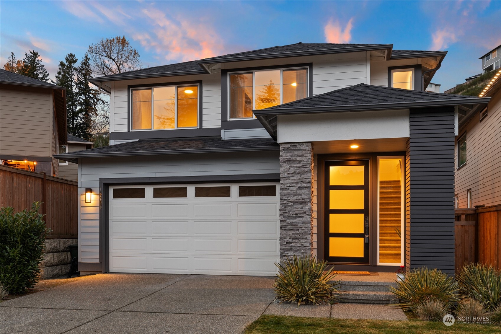 16205 27th St Court East Lake Tapps, WA 98391 - Photo 1 of 39 a front view of a house