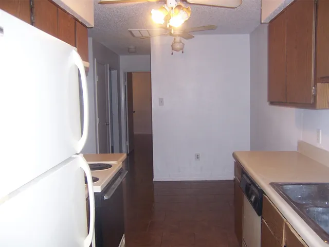 a room with a sink and chandelier