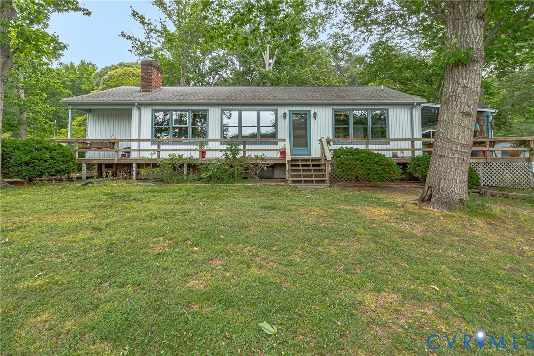 142 Bridge Lane Reedville, VA 22539 - Photo 45 of 56 a view of a house with a yard and sitting area
