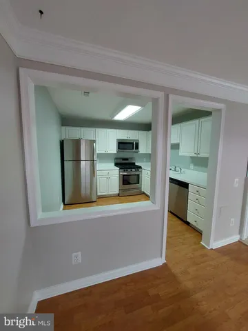 a view of kitchen and living room