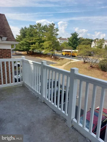 a view of swimming pool with outdoor seating