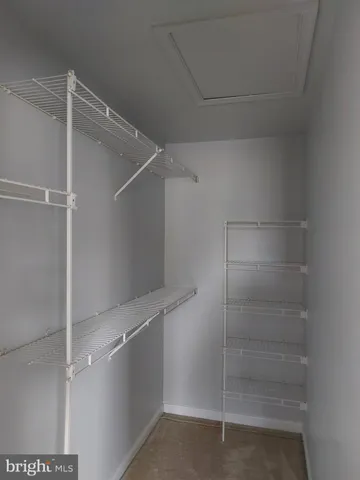 a view of an empty walk in closet
