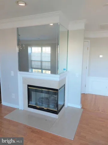 a room with a fireplace and a fireplace