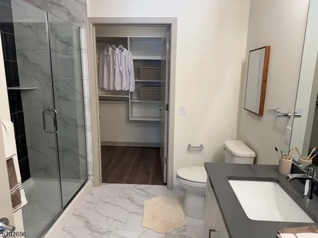 a bathroom with a toilet and a sink