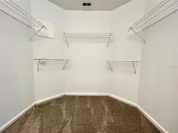 a view of a room with racks on the wall