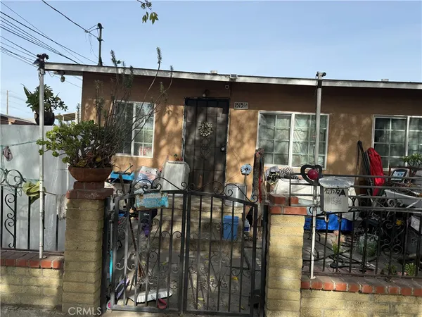 a front view of a house with street