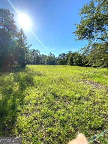 a view of an outdoor space and a yard