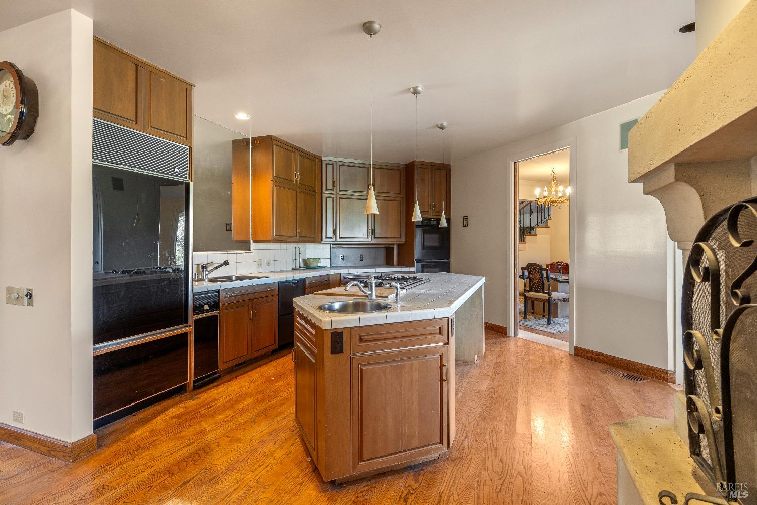 3295 Warm Springs Road Glen Ellen, CA 95442 - Photo 22 of 37 a kitchen with stainless steel appliances granite countertop a sink stove and refrigerator