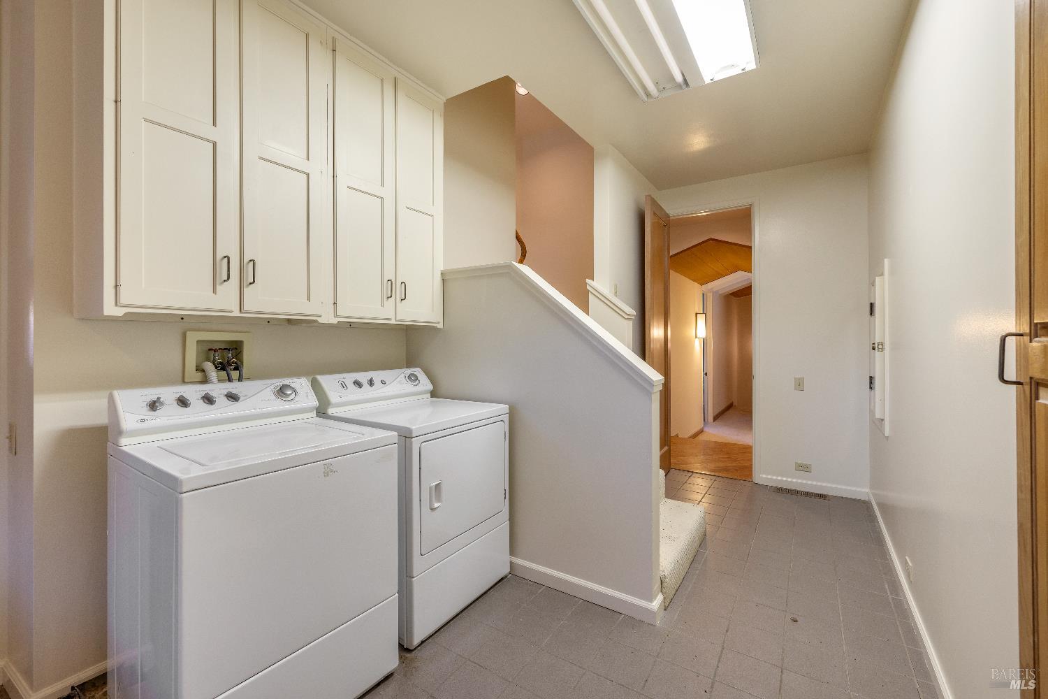 3295 Warm Springs Road Glen Ellen, CA 95442 - Photo 29 of 37 a view of storage and utility room with washer and dryer
