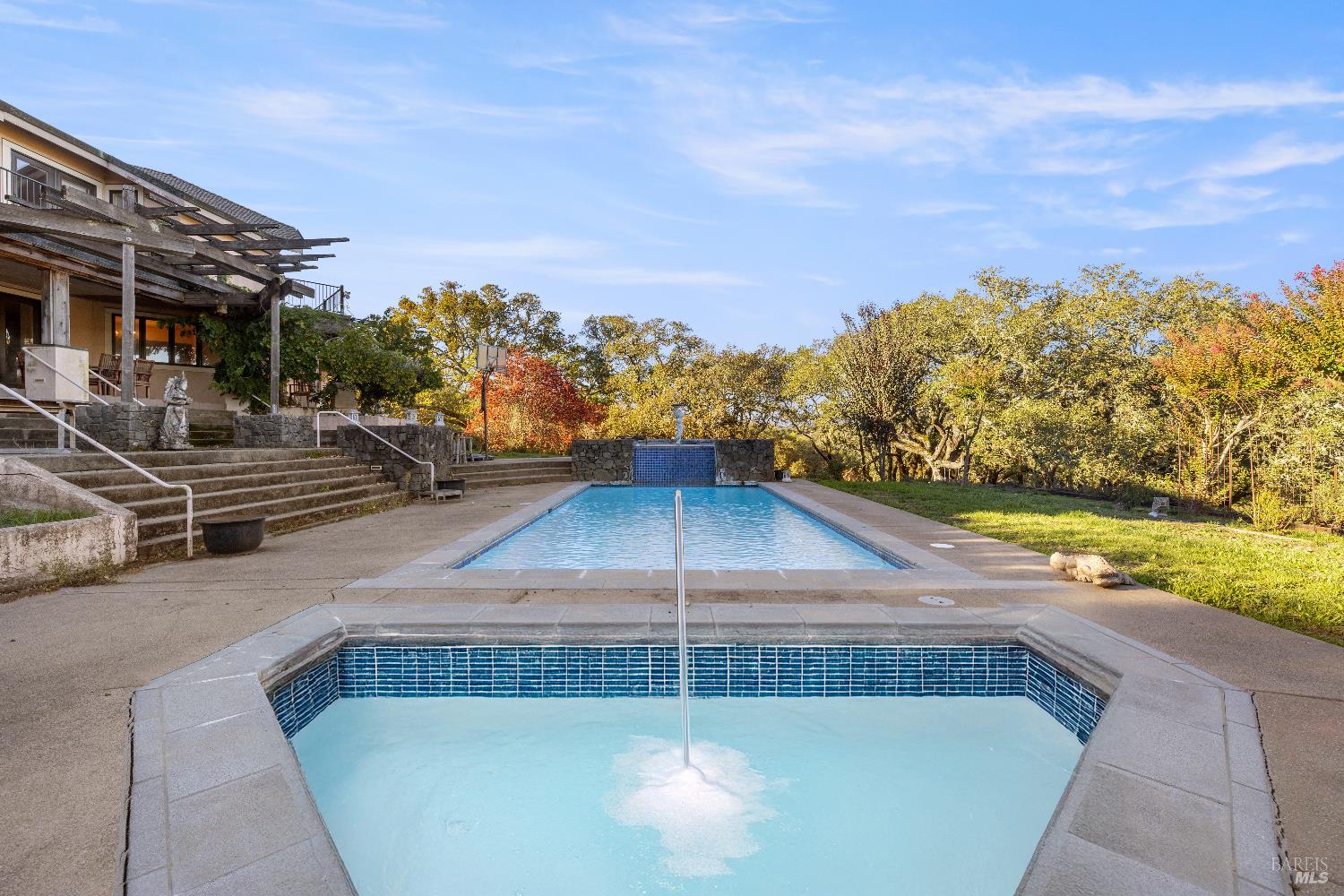 3295 Warm Springs Road Glen Ellen, CA 95442 - Photo 5 of 37 a view of a swimming pool with an outdoor seating