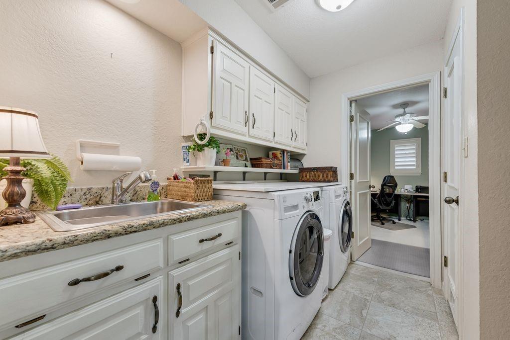 802 Riva Ridge Wylie, TX 75098 - Photo 17 of 39 a view of living room with washer and dryer