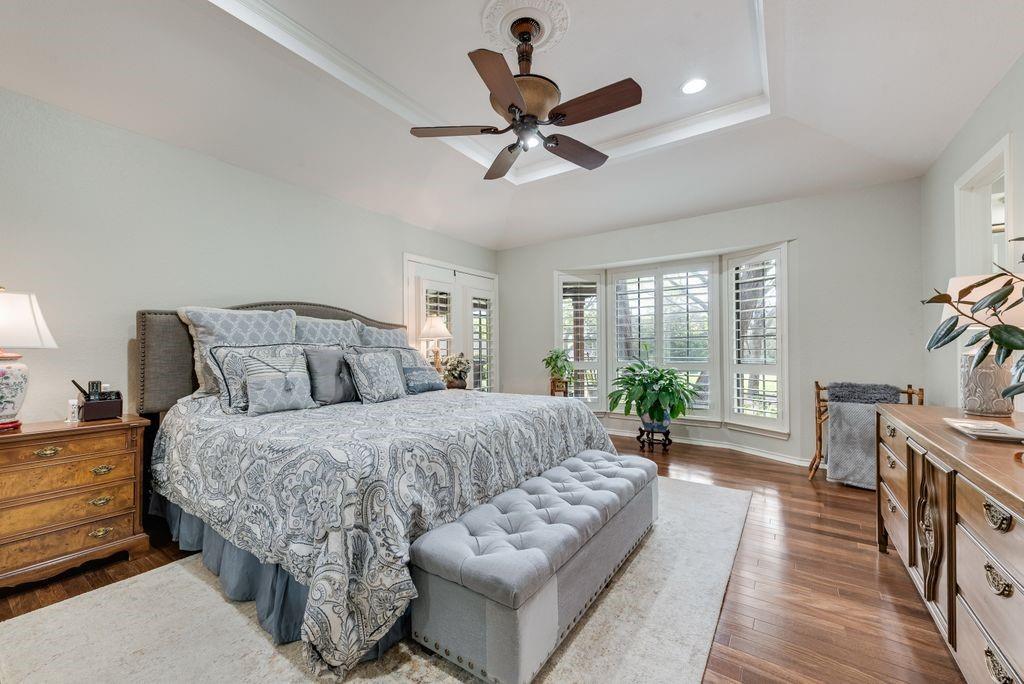 802 Riva Ridge Wylie, TX 75098 - Photo 19 of 39 a bed room with a bed and a couch