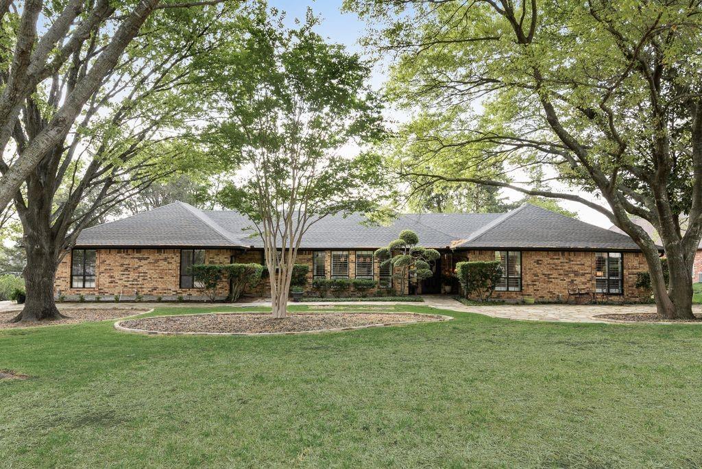 802 Riva Ridge Wylie, TX 75098 - Photo 2 of 39 a front view of a house with a yard