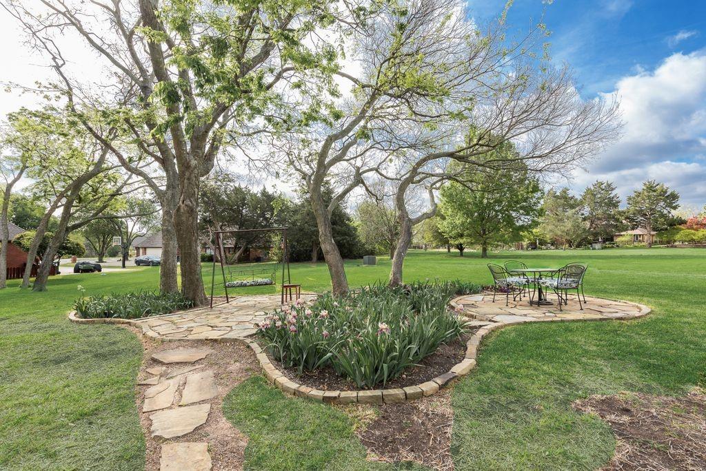 802 Riva Ridge Wylie, TX 75098 - Photo 34 of 39 a view of a garden with an outdoor space