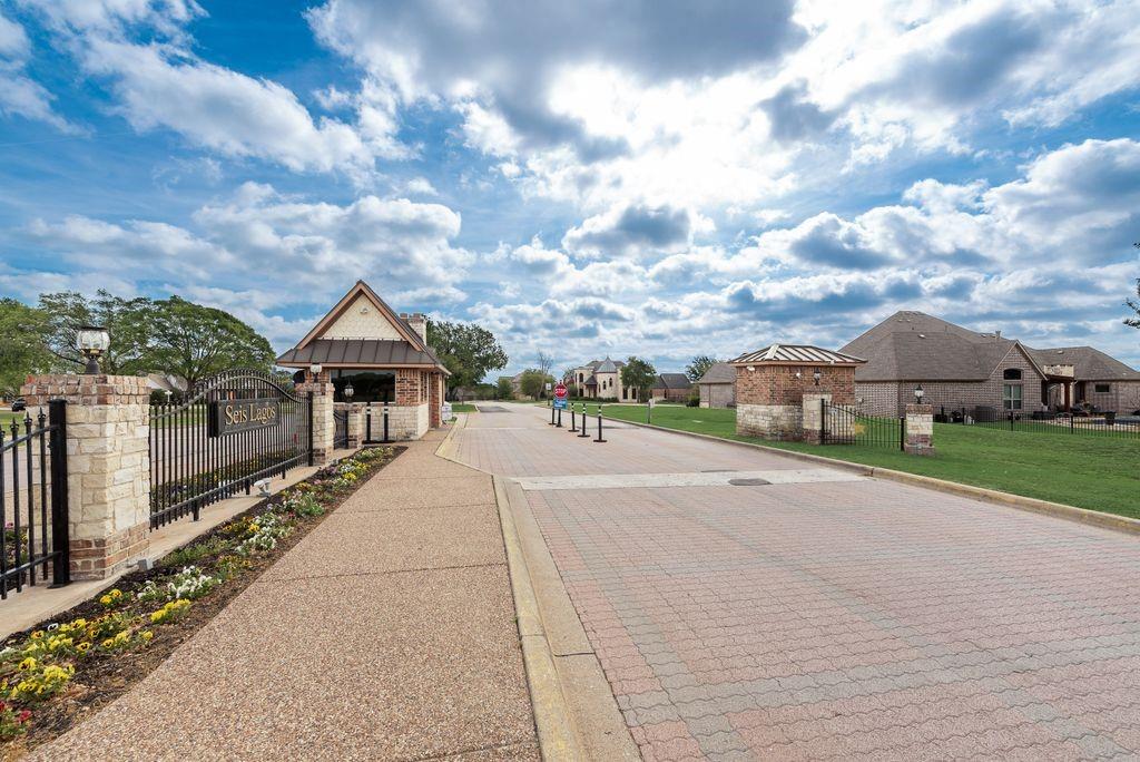 802 Riva Ridge Wylie, TX 75098 - Photo 35 of 39 24-7 Guard gated entrance.