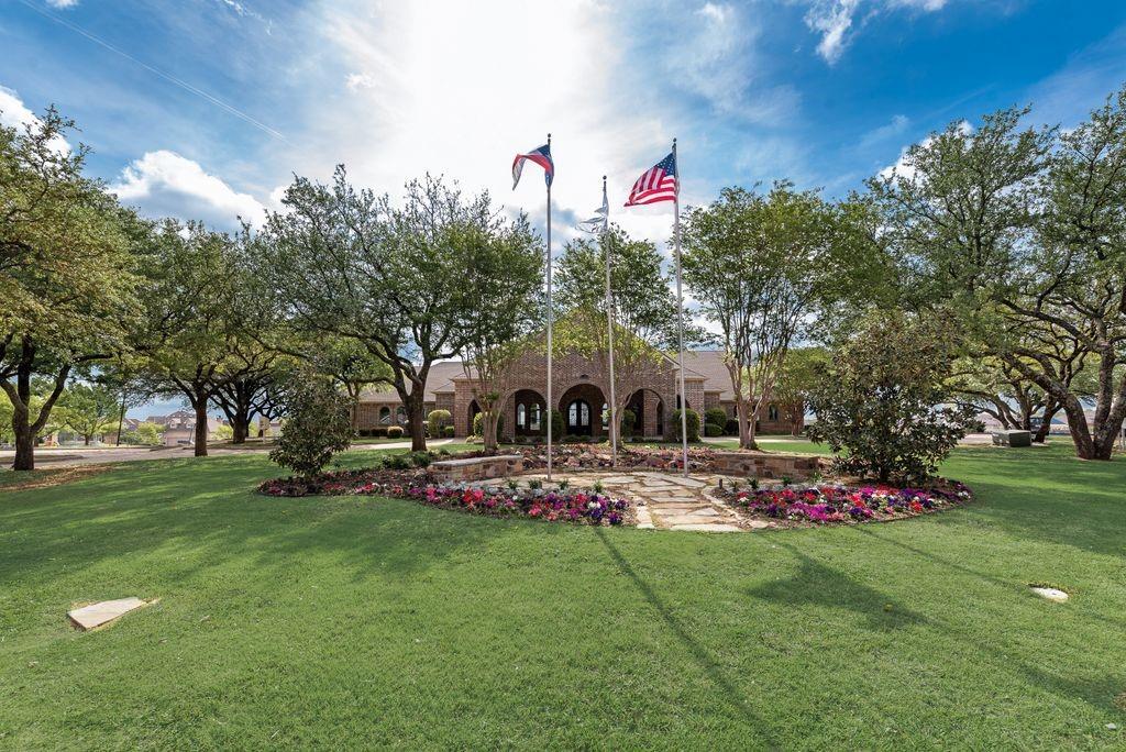 802 Riva Ridge Wylie, TX 75098 - Photo 36 of 39 a front view of a house with garden