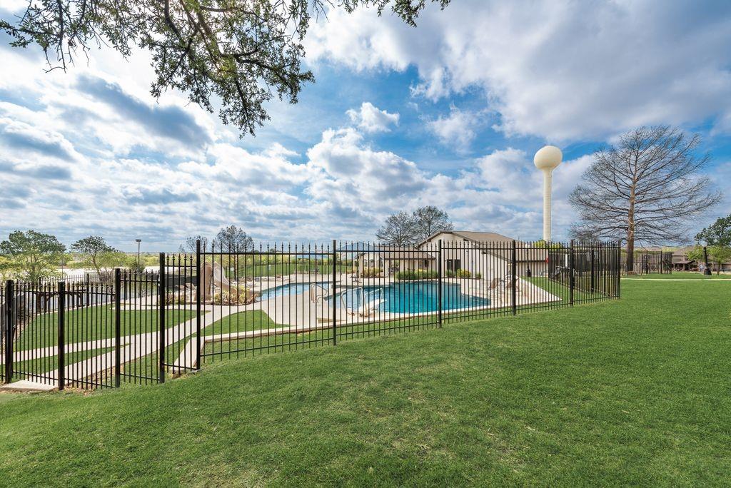 802 Riva Ridge Wylie, TX 75098 - Photo 39 of 39 a view of a garden with a house in the background