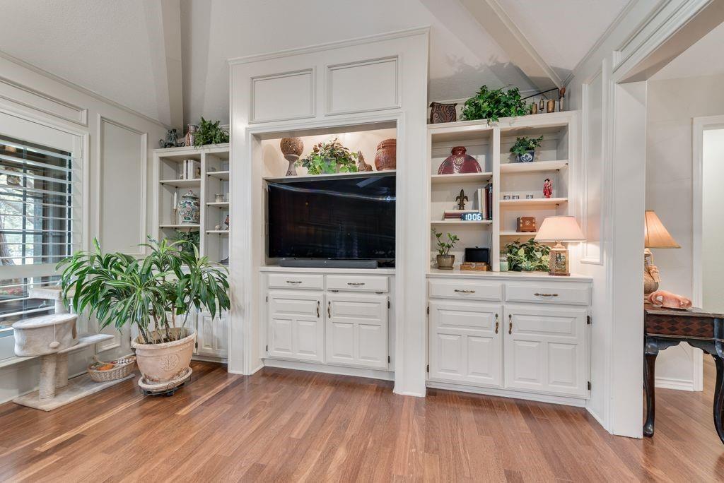 802 Riva Ridge Wylie, TX 75098 - Photo 9 of 39 a living room with furniture potted plant and flat screen tv