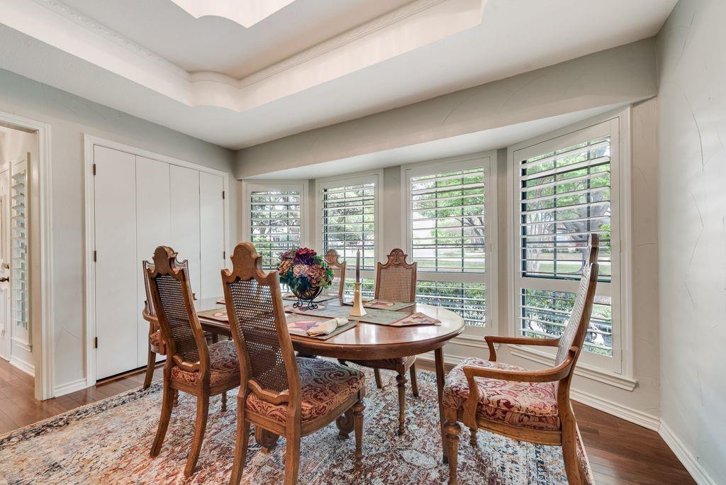 802 Riva Ridge Wylie, TX 75098 - Photo 10 of 39 a view of a dining room with furniture window and wooden floor