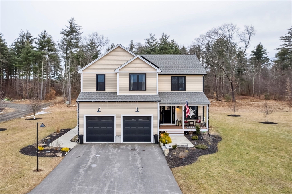 58 Folly Mill Road Salisbury, MA 01952 - Photo 1 of 31 a front view of a house with parking space
