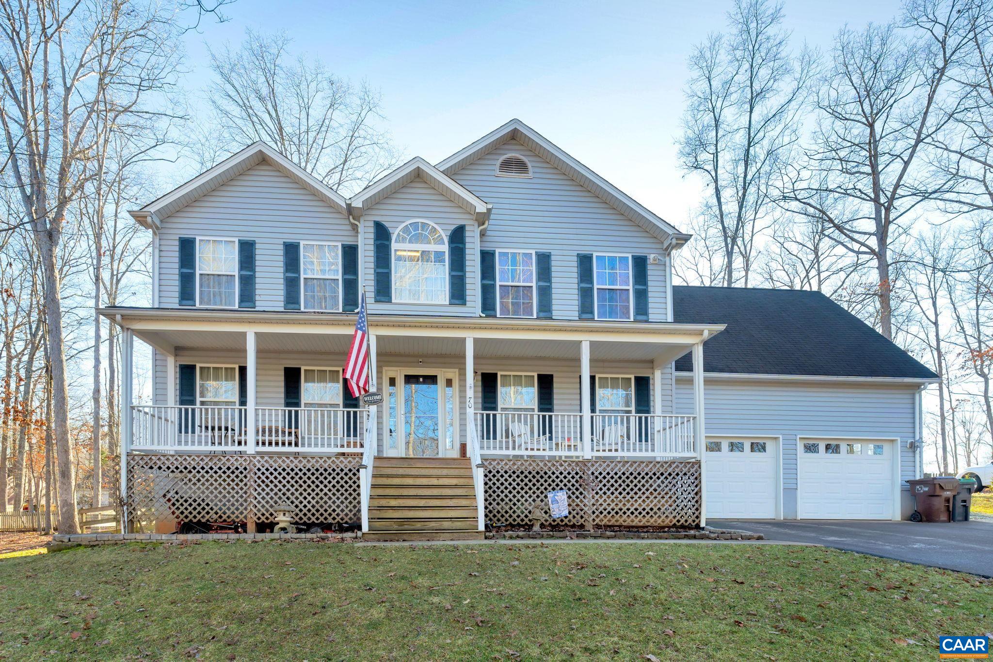 70 Laguna Road Palmyra, VA 22963 - Photo 1 of 33 front view of house with a yard