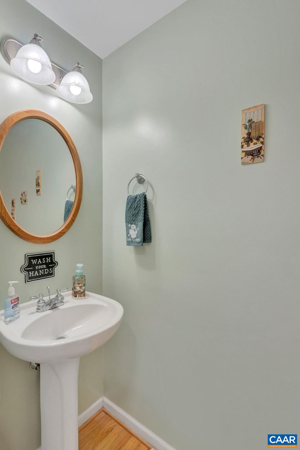 70 Laguna Road Palmyra, VA 22963 - Photo 16 of 33 a bathroom with a sink and a mirror