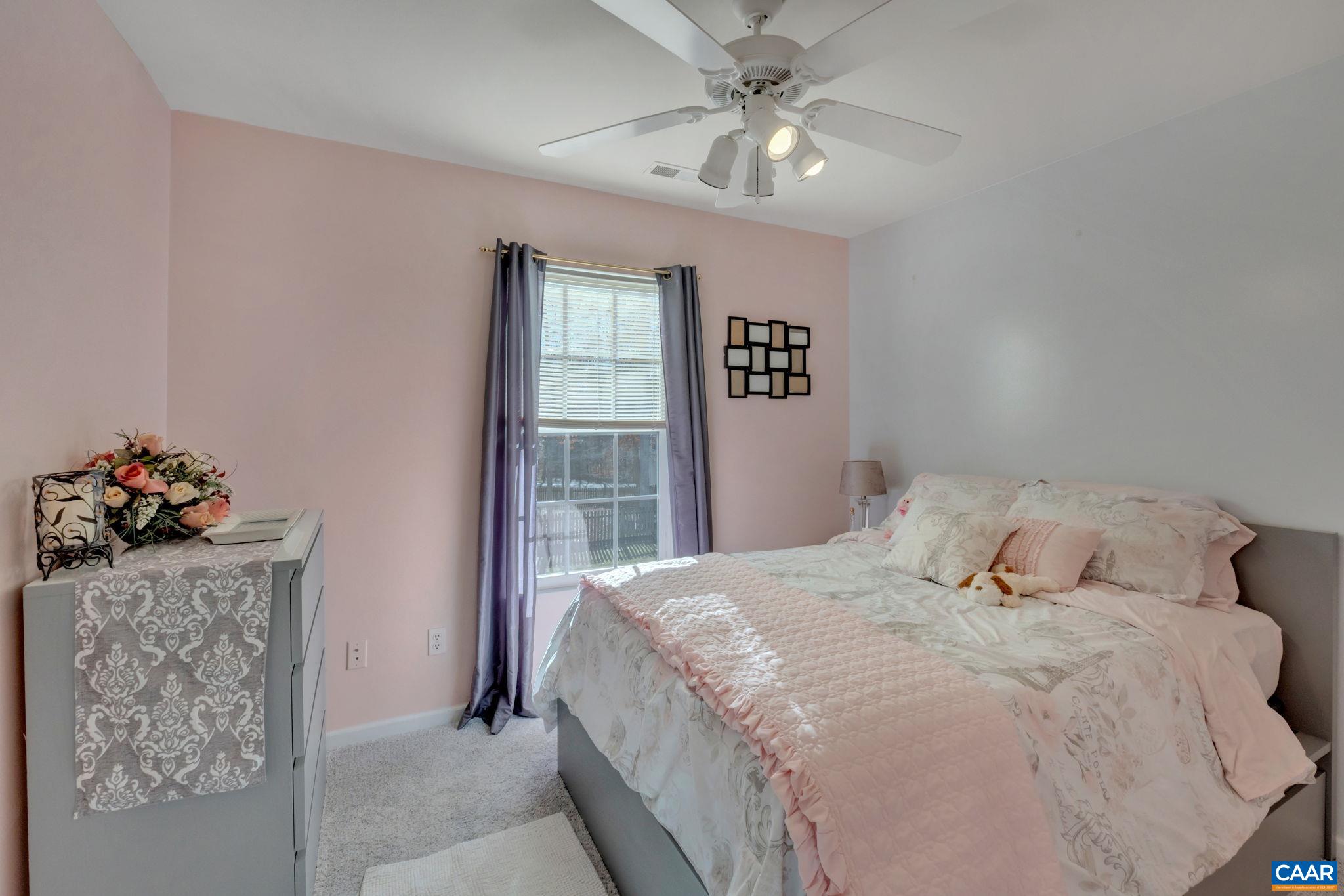 70 Laguna Road Palmyra, VA 22963 - Photo 22 of 33 a bedroom with a bed and a window