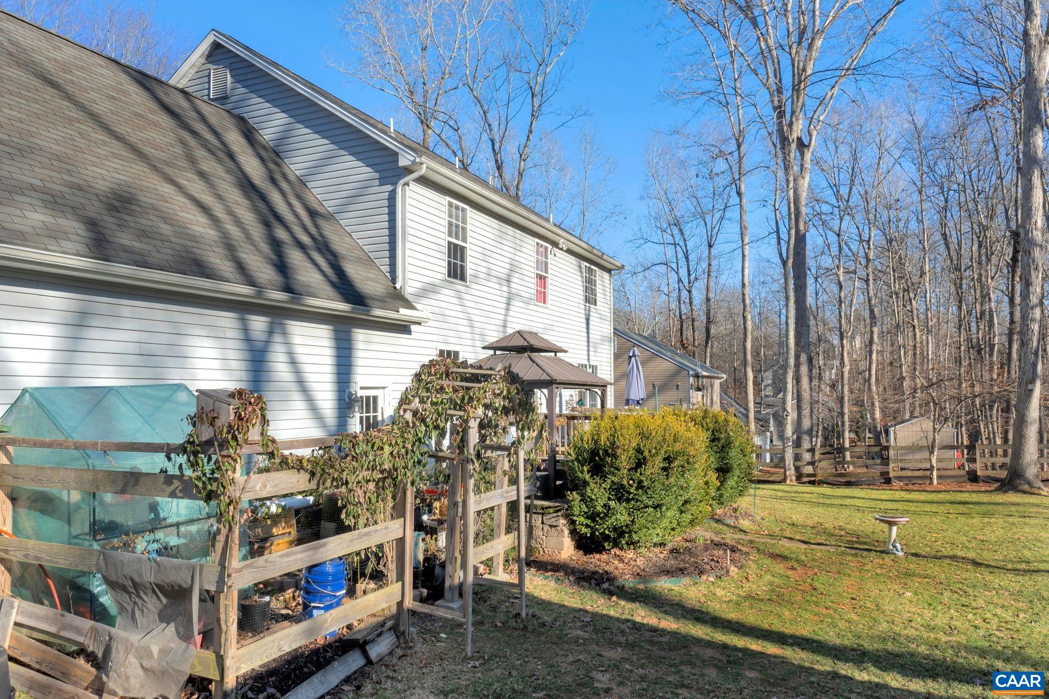 70 Laguna Road Palmyra, VA 22963 - Photo 30 of 33 a view of a house with a yard