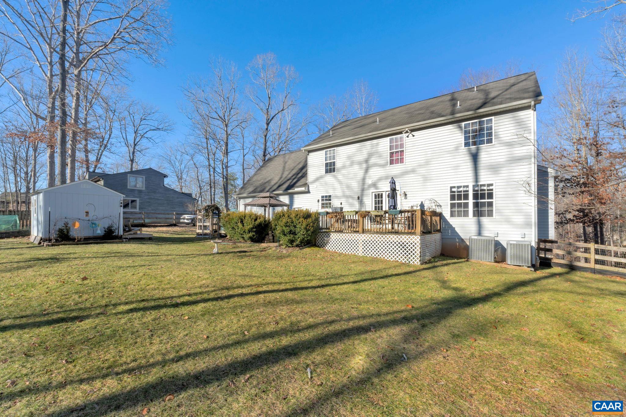 70 Laguna Road Palmyra, VA 22963 - Photo 33 of 33 a view of swimming pool with outdoor seating and yard in the back