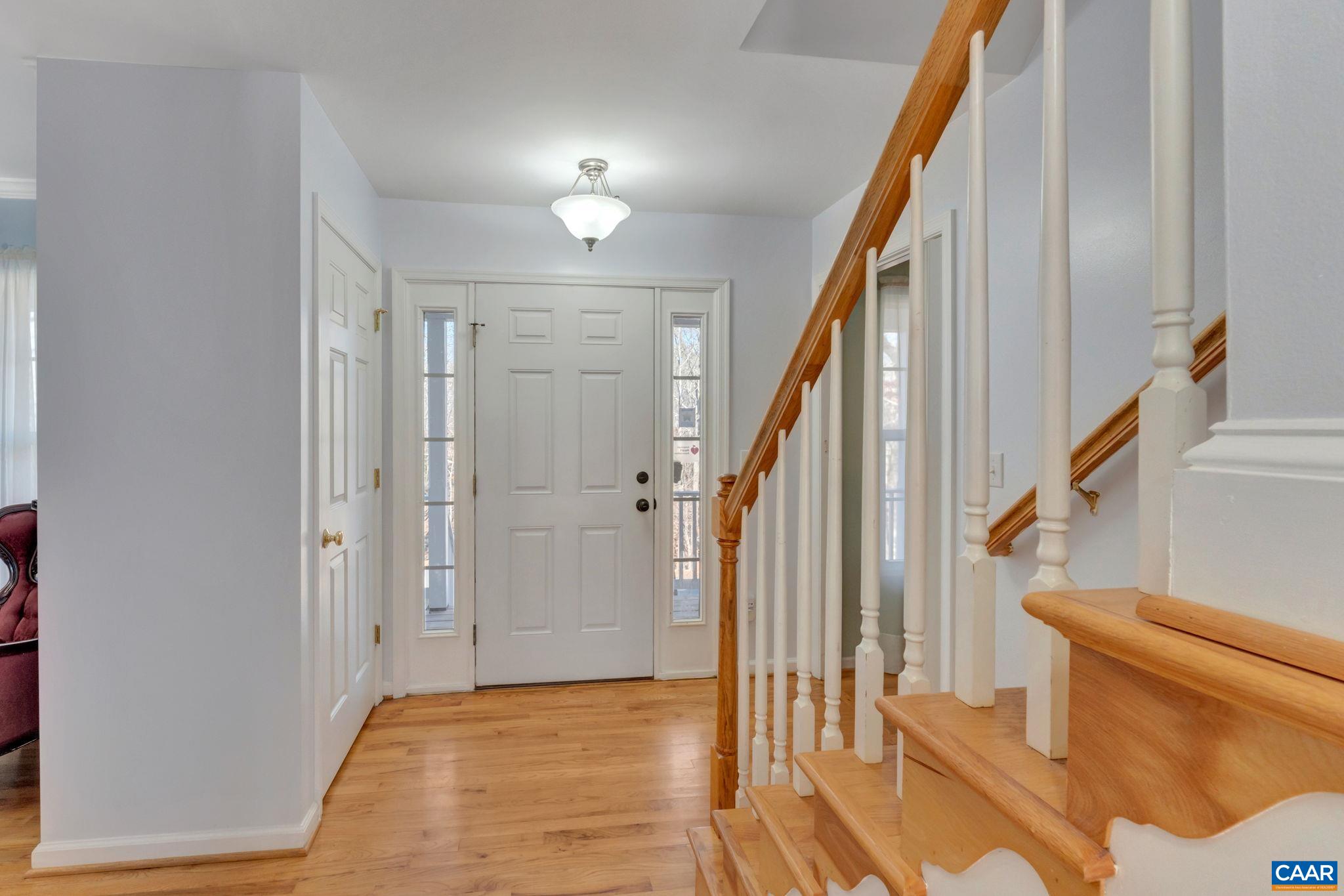 70 Laguna Road Palmyra, VA 22963 - Photo 6 of 33 a view of entryway with wooden floor and door
