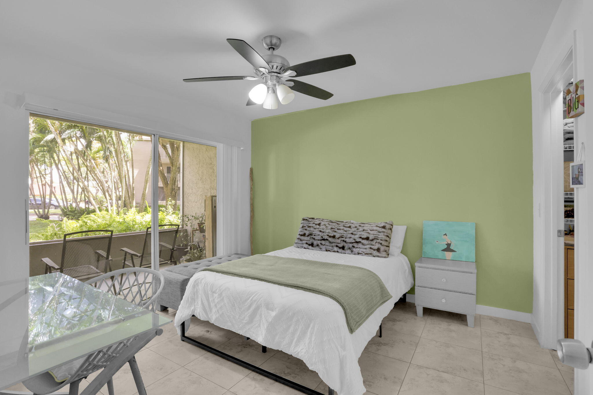 1825 Palm Cove Boulevard, Unit 7102 Delray Beach, FL 33445 - Photo 8 of 19 a bedroom with a bed and a window