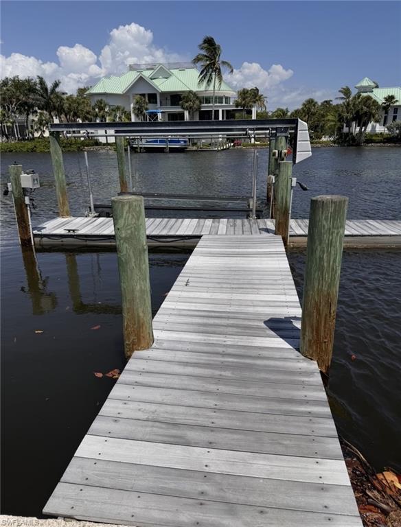27510 Big Bend Road Bonita Springs, FL 34134 - Photo 12 of 23 a view of a balcony with two chairs