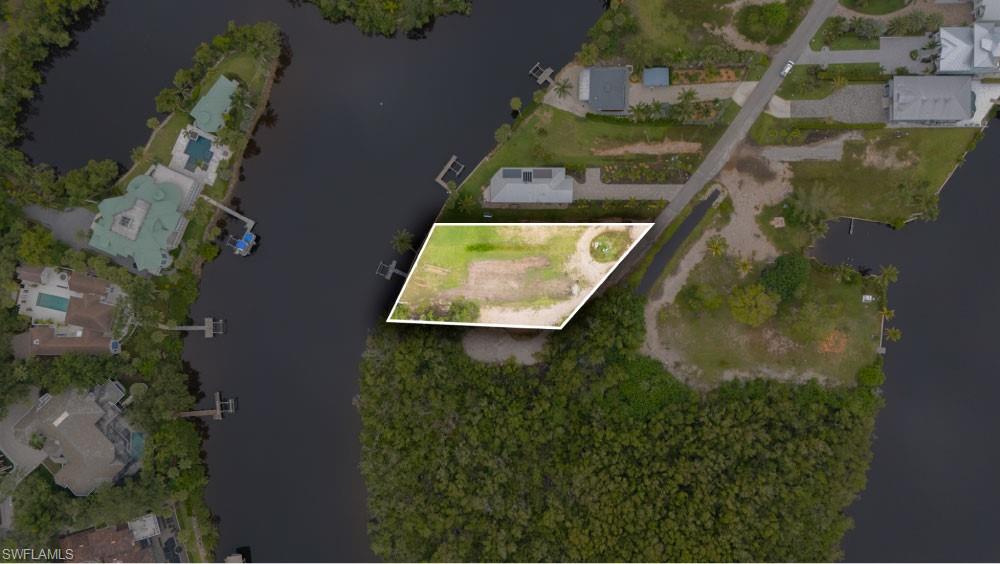 27510 Big Bend Road Bonita Springs, FL 34134 - Photo 21 of 23 an aerial view of a residential houses with outdoor space