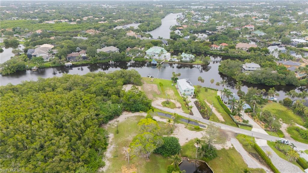 27510 Big Bend Road Bonita Springs, FL 34134 - Photo 4 of 23 an aerial view of residential houses with outdoor space