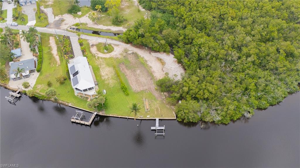 27510 Big Bend Road Bonita Springs, FL 34134 - Photo 5 of 23 view of a wooden floor with a plant in the background