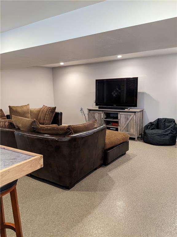 223 S Trail Butler, PA 16002 - Photo 13 of 24 a living room with furniture and a flat screen tv